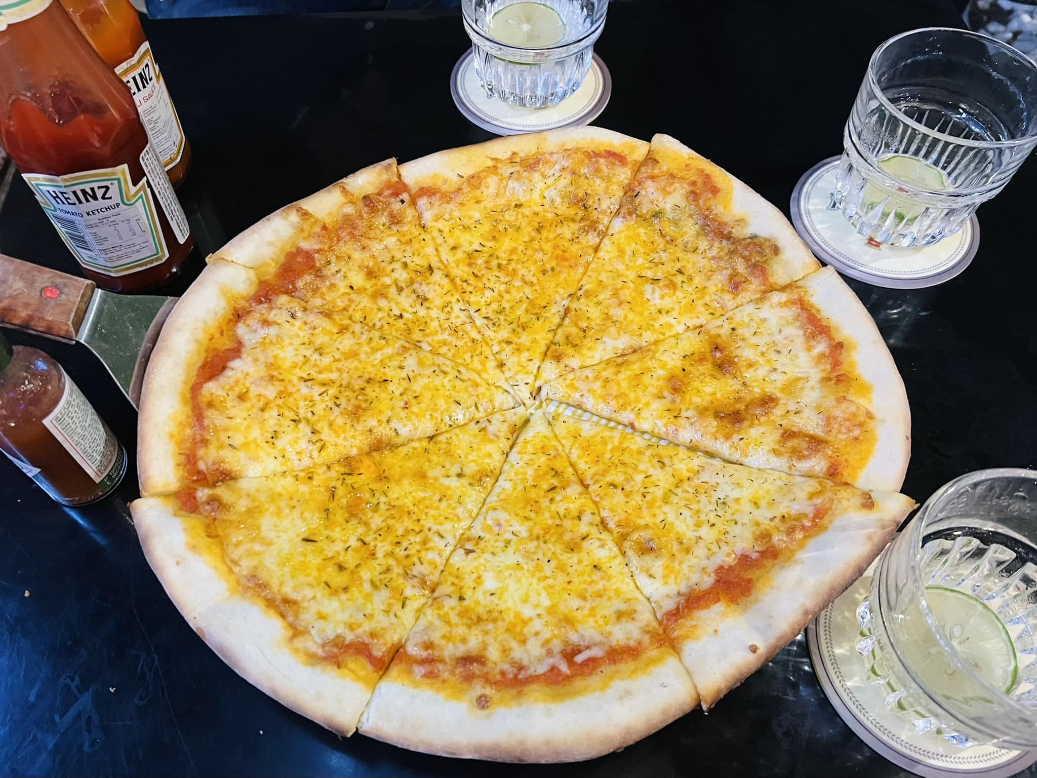 The wood-fired pizzas are known for their crispy crust and rich, well-balanced flavors